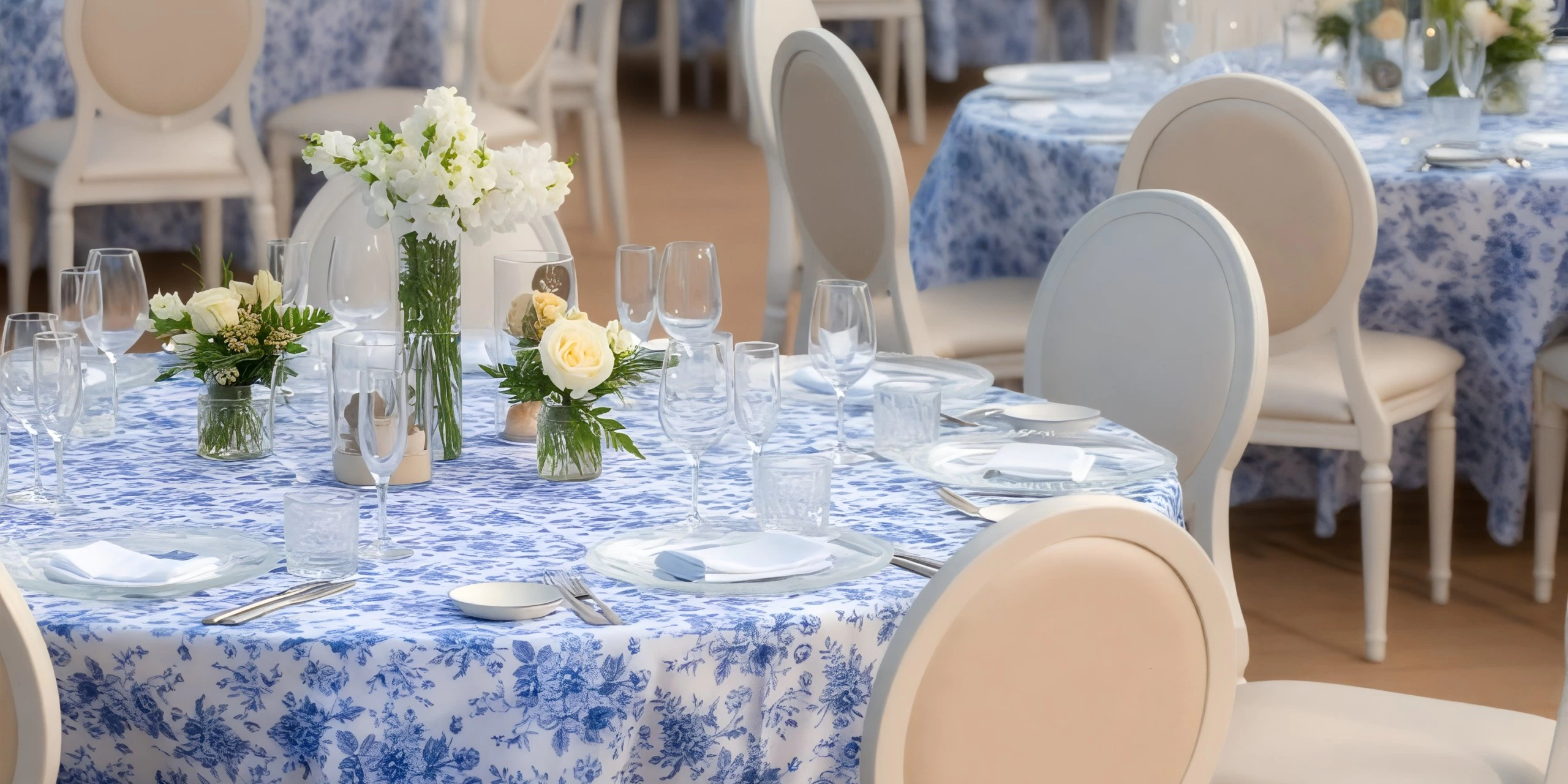 Outdoor reception tables near beach and pool with ocean views at Dreams Cap Cana Infinity Pool Deck
