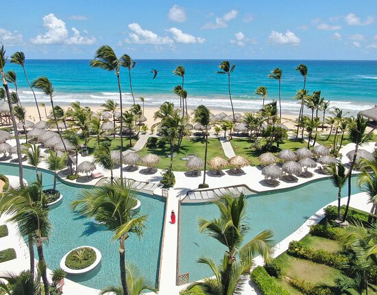 Excellence Punta Cana adults-only all-inclusive resort with beachfront suites and tropical pools in Dominican Republic.