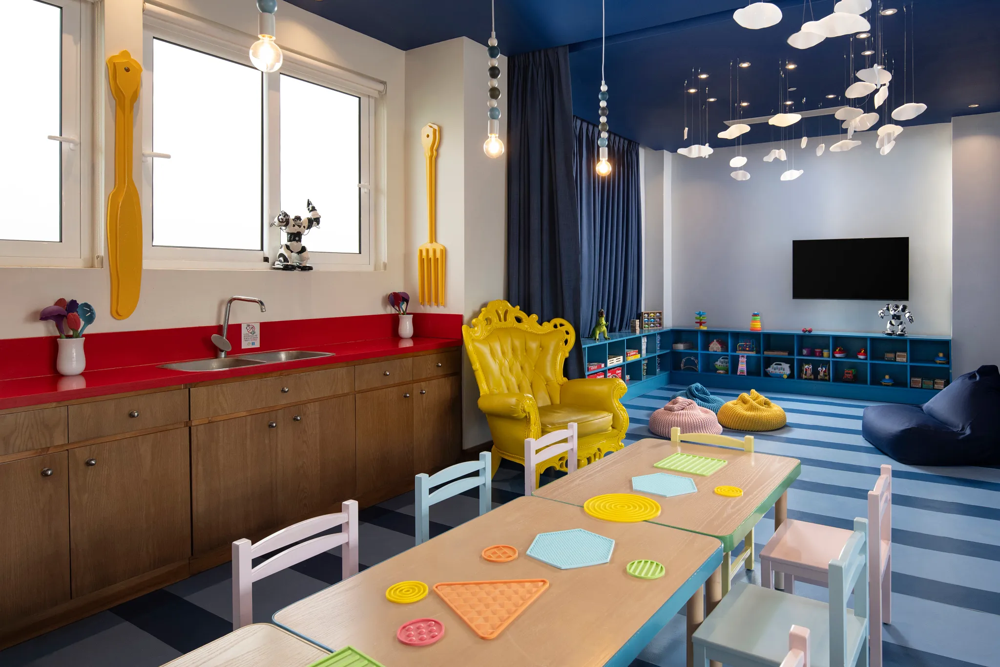 Colorful kids club playroom at Dreams Cap Cana Resort & Spa with toys and activity tables.