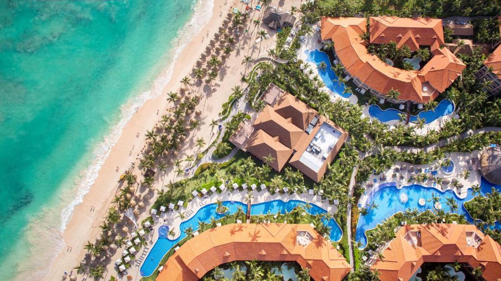 Majestic Elegance Punta Cana all-inclusive resort with beachfront pools and separate adults-only and family sections.
