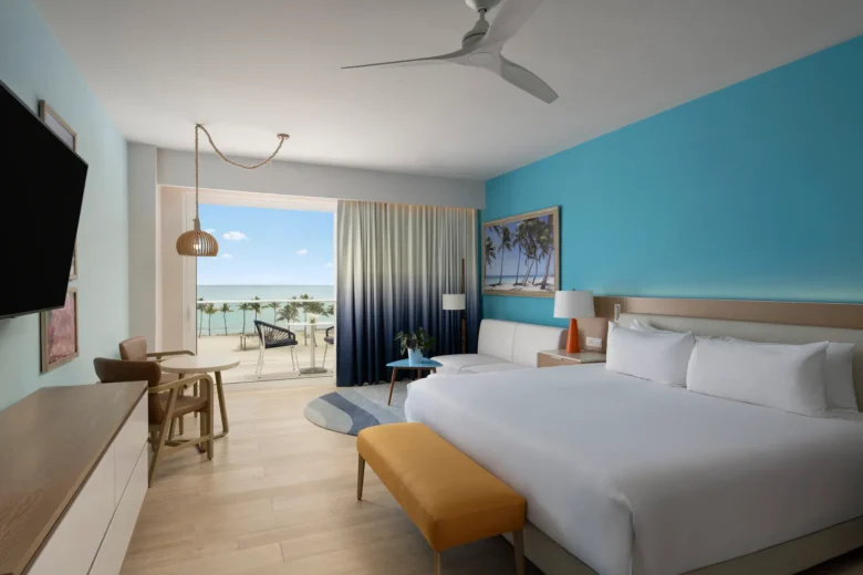 Preferred Club Deluxe Ocean Front Swim Out King room with balcony and ocean view at Dreams Cap Cana Resort & Spa.