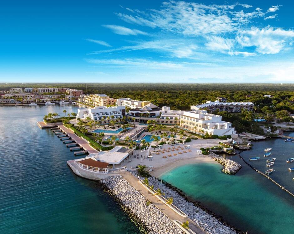 TRS Cap Cana adults-only luxury hotel with marina views and modern infinity pools in Punta Cana.